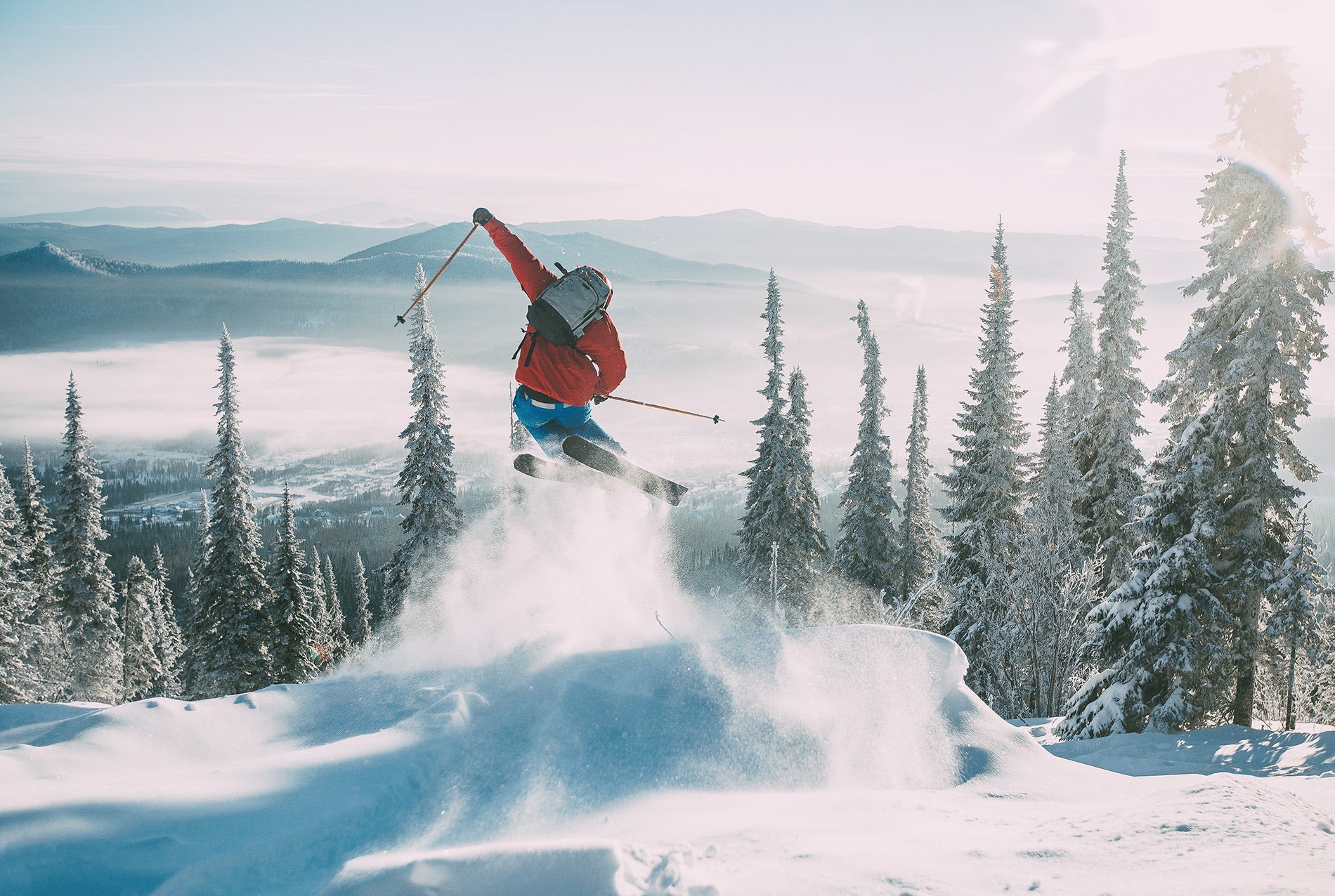 Man jumping a ski barrier in Eurosock Ski Surpreme socks